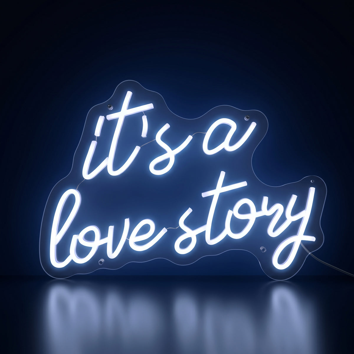 It's a Love Story white LED neon sign glowing in a dark room