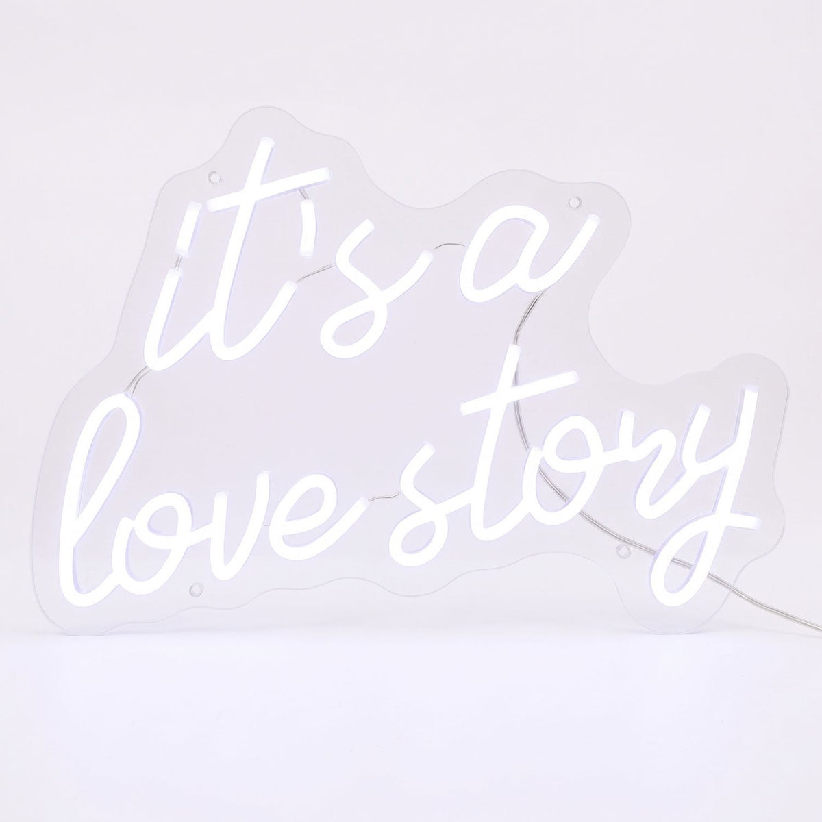 It's a Love Story white LED neon sign on clear acrylic