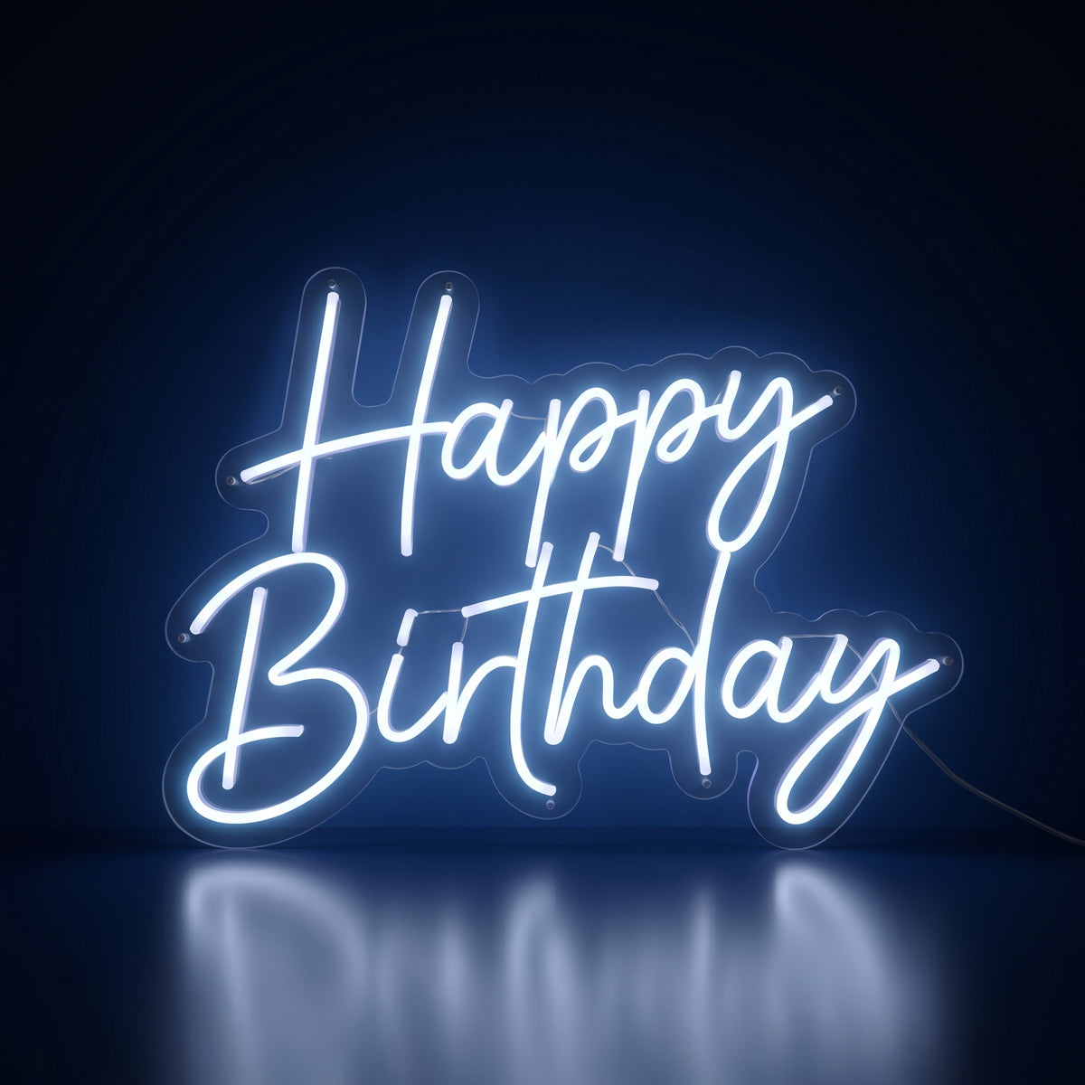 Happy Birthday white LED neon sign glowing in a dark room